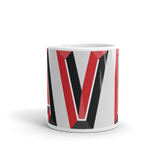 White coffee mug with "AVL" and Asheville statistics printed on it.