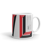 White coffee mug with "AVL" and Asheville statistics printed on it.