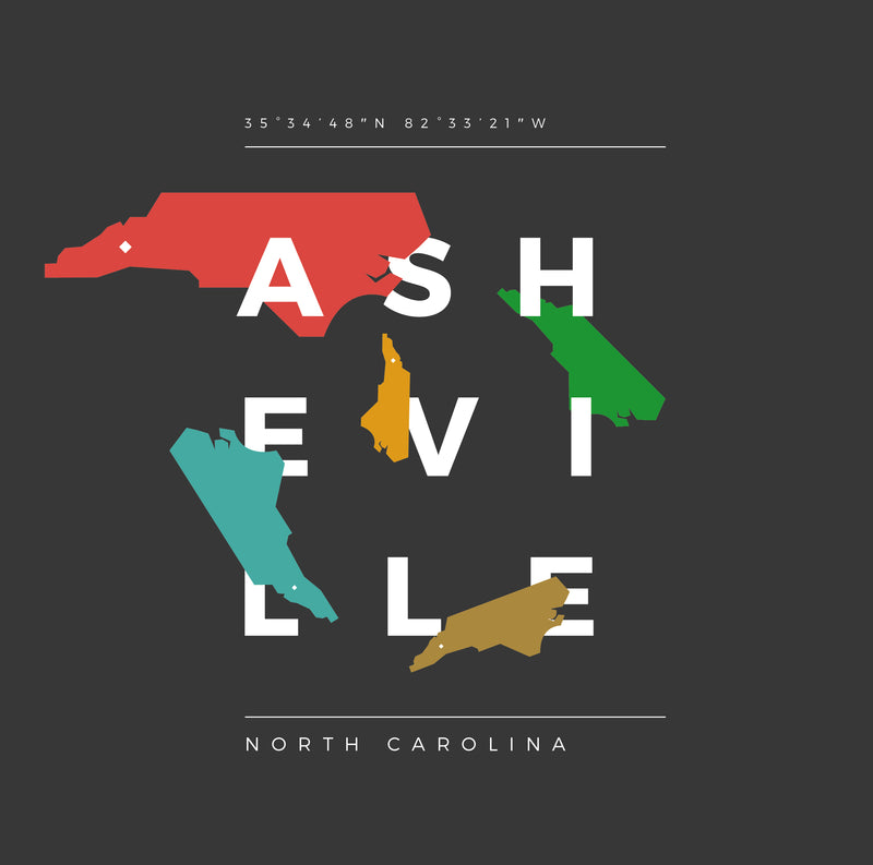 Close up of asheville t-shirt with random, colorful NC state shapes.