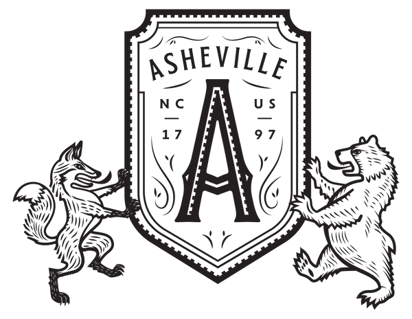 close up of  t-shirt of bear and fox holding a shield with "A" for Asheville, North Carolina