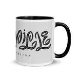 white coffee mug with "Asheville" written in custom lettering. Black interior and handle.