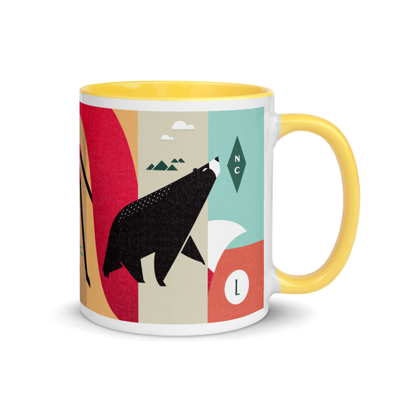 coffee mug with silly illustration of red fox, black bear and red-tailed hawk - yellow interior